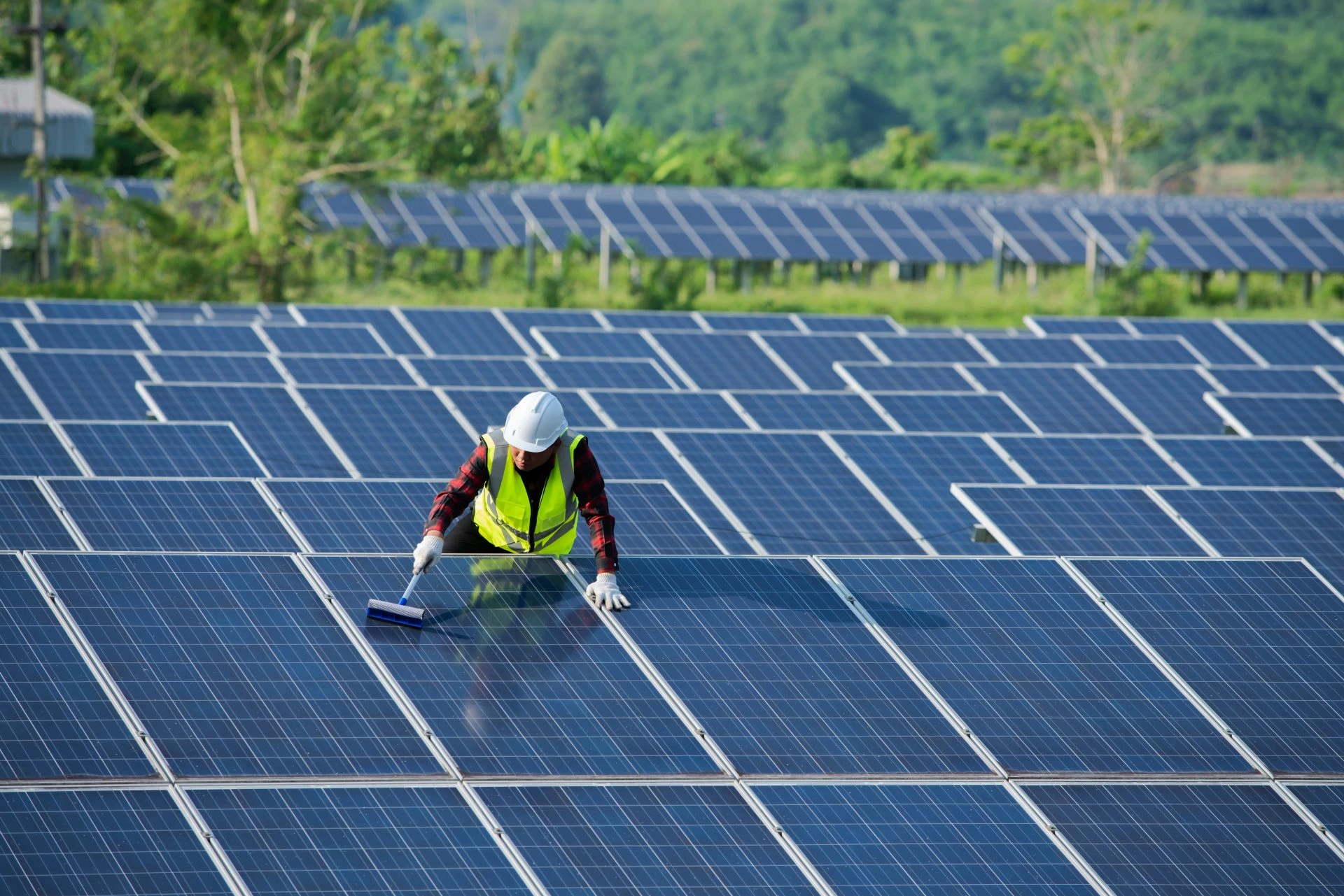 cleaning solar panels by workers in uniform safety 2022 11 02 17 35 33 utc